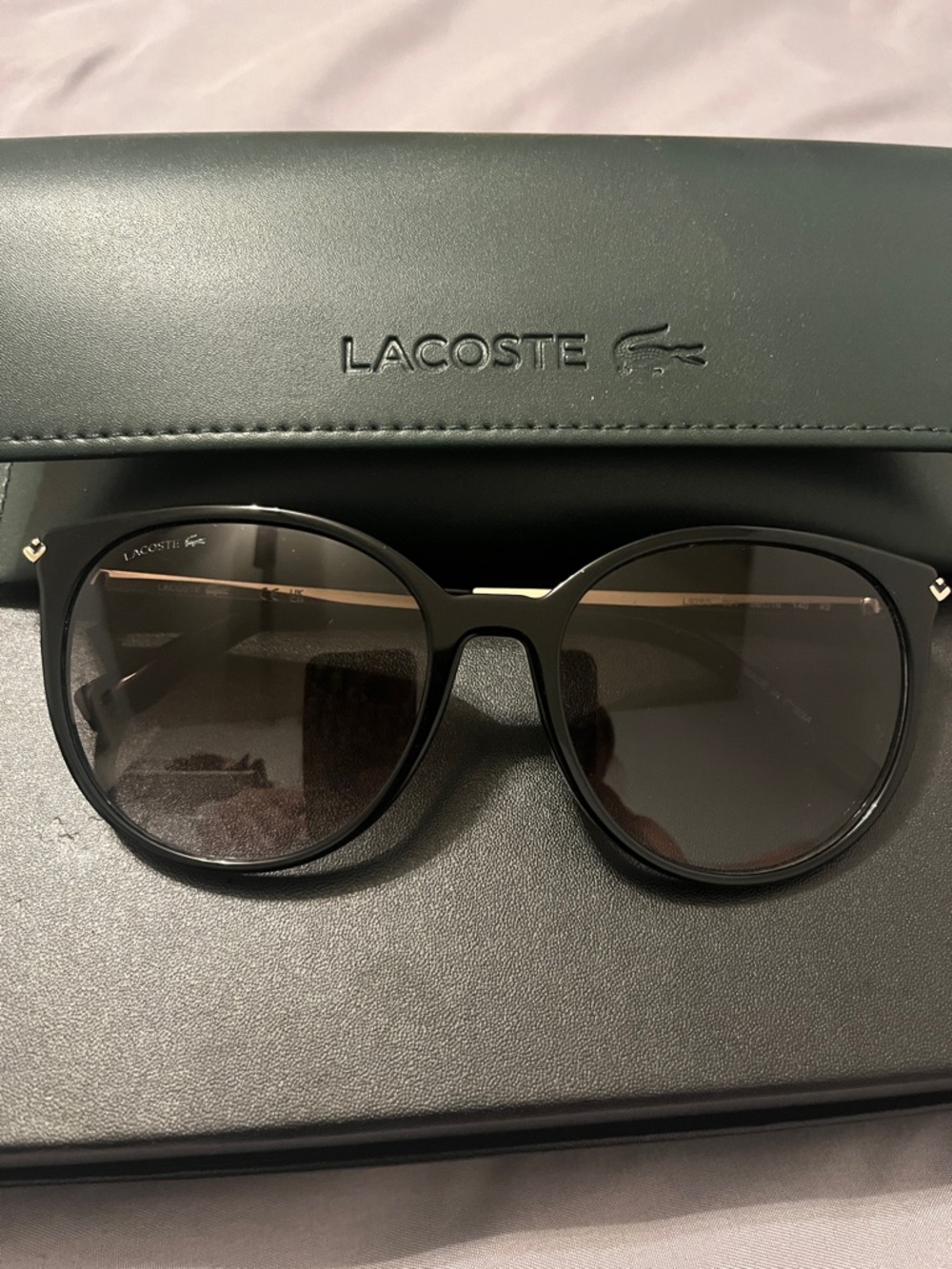 Lacoste Black Round Women's Sunglasses with Dark Lenses